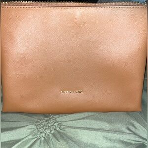 Tan Michael Kors medium makeup bag